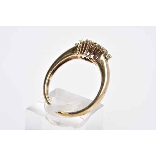 112 - A 9CT GOLD CUBIC ZIRCONIA CLUSTER RING, of a lozenge form, set with circular cut cubic zirconia, pla... 