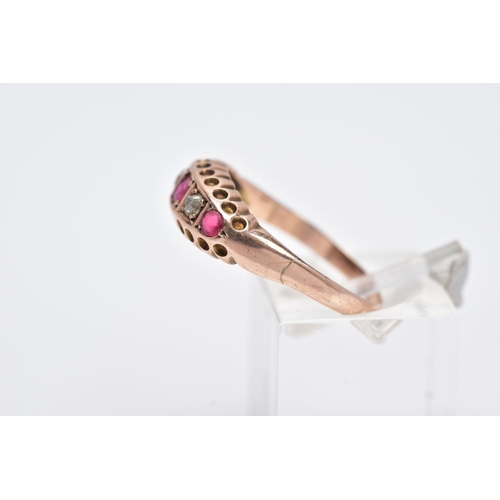 114 - A 9CT GOLD RUBY AND DIAMOND BOAT RING, designed with a row of circular cut rubies interspaced with r... 