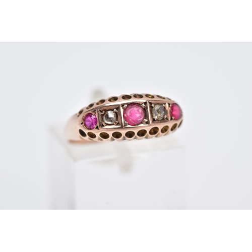 114 - A 9CT GOLD RUBY AND DIAMOND BOAT RING, designed with a row of circular cut rubies interspaced with r... 