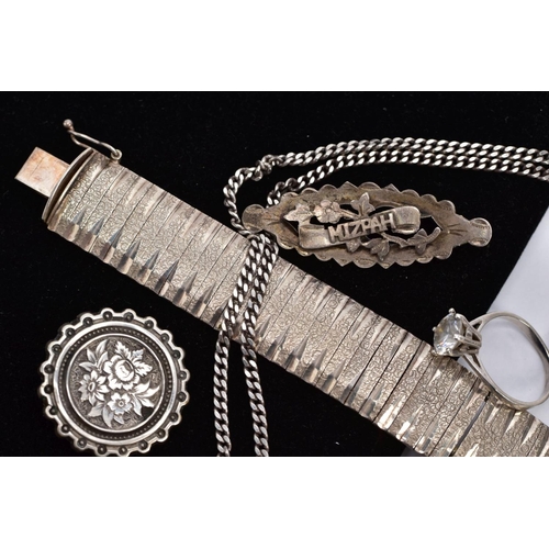 29 - A SELECTION OF SILVER AND WHITE METAL ITEMS, to include a textured silver articulated bracelet, hall... 
