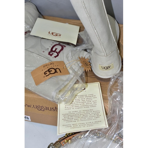 528 - A LADIES LIGHT BROWN LEATHER HANDBAG WITH DECORATIVE HANDLE, together with a boxed pair of ladies pa... 