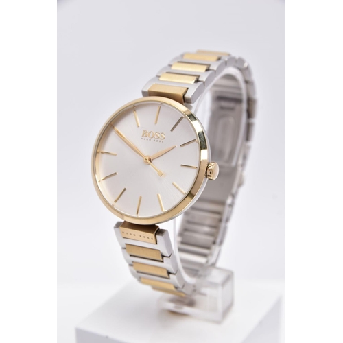70 - A 'HUGO BOSS' WRISTWATCH, round silver dial signed 'Boss, Hugo Boss', baton markers, gold tone hands... 