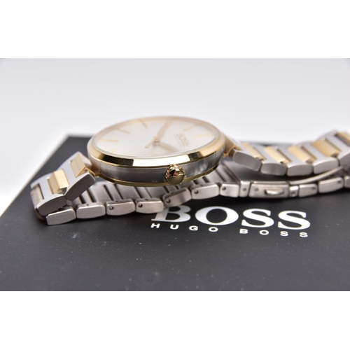70 - A 'HUGO BOSS' WRISTWATCH, round silver dial signed 'Boss, Hugo Boss', baton markers, gold tone hands... 