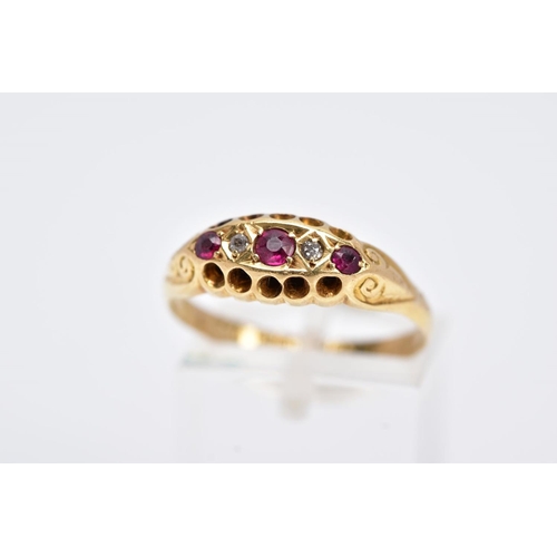 74 - AN EARLY 20TH CENTURY DIAMOND AND RUBY RING, of a boat shape, set with three circular cut rubies, in... 
