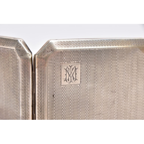 77 - A SILVER CIGARETTE CASE, of a square form, engine turn design with an engraved monogram, push button... 