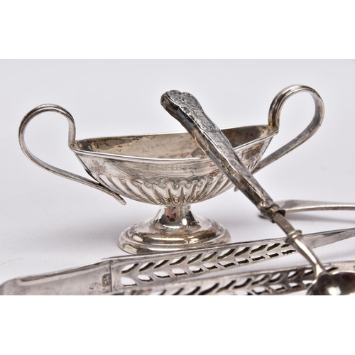 83 - A SELECTION OF SILVER ITEMS, to include a pair of pierced sugar tongs with shell shaped ends, hallma... 