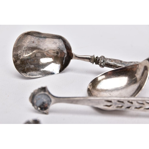 83 - A SELECTION OF SILVER ITEMS, to include a pair of pierced sugar tongs with shell shaped ends, hallma... 