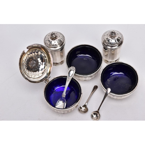 84 - A FIVE PIECE GEORGIAN SILVER CONDIMENTS SETSSET, to include two salts each with a blue glass lining,... 