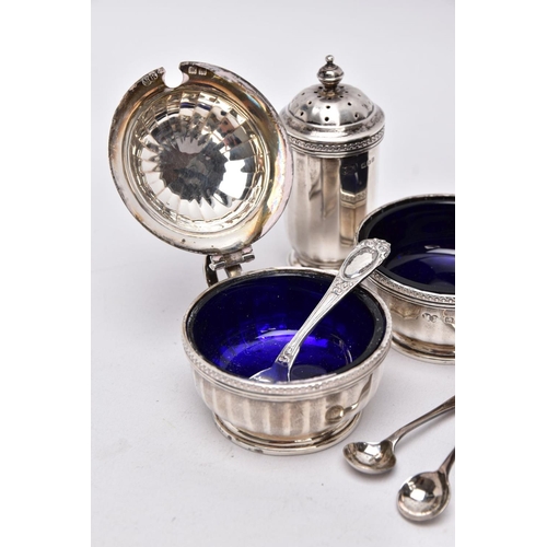 84 - A FIVE PIECE GEORGIAN SILVER CONDIMENTS SETSSET, to include two salts each with a blue glass lining,... 