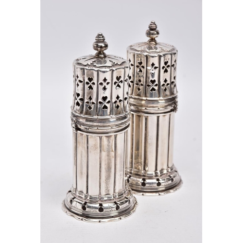 86 - TWO GEORGE V SILVER SUGAR CASTERS, column form, wavy openwork base, pierced cover with a ball finial... 