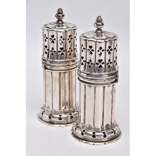 86 - TWO GEORGE V SILVER SUGAR CASTERS, column form, wavy openwork base, pierced cover with a ball finial... 