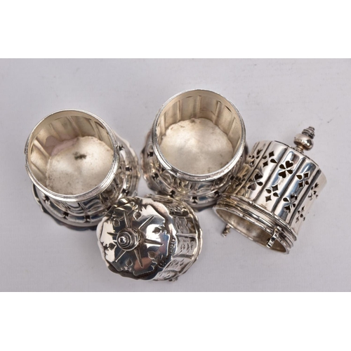 86 - TWO GEORGE V SILVER SUGAR CASTERS, column form, wavy openwork base, pierced cover with a ball finial... 