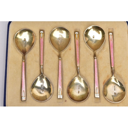 87 - TWO CASED SETS OF SILVER, GUILLOCHE ENAMEL COFFEE AND TEASPOONS, the first a set of six pink guilloc... 