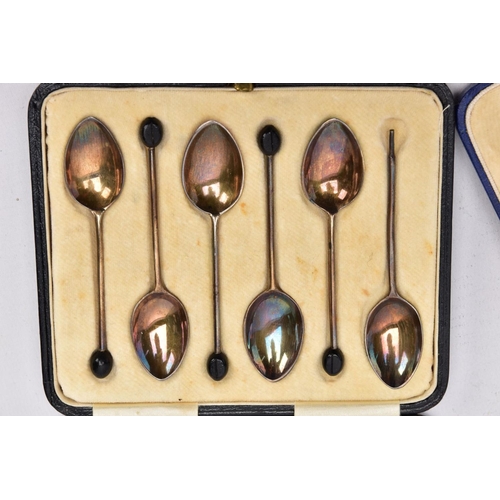 87 - TWO CASED SETS OF SILVER, GUILLOCHE ENAMEL COFFEE AND TEASPOONS, the first a set of six pink guilloc... 