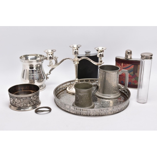91 - A SELECTION OF WHITE METAL ITEMS, to include a silver plated on copper round tray, with a pierced wr... 