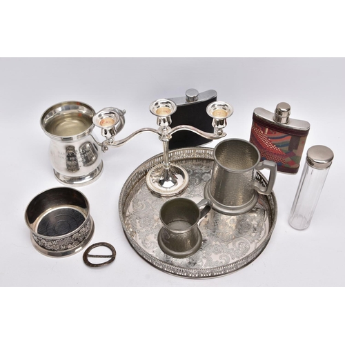 91 - A SELECTION OF WHITE METAL ITEMS, to include a silver plated on copper round tray, with a pierced wr... 