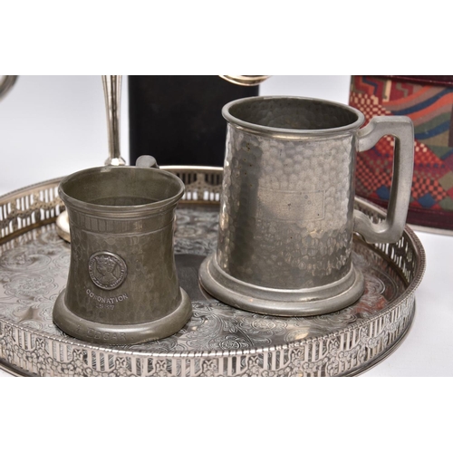91 - A SELECTION OF WHITE METAL ITEMS, to include a silver plated on copper round tray, with a pierced wr... 