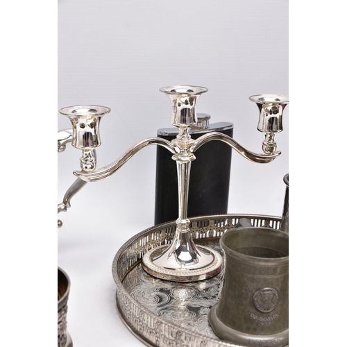 91 - A SELECTION OF WHITE METAL ITEMS, to include a silver plated on copper round tray, with a pierced wr... 