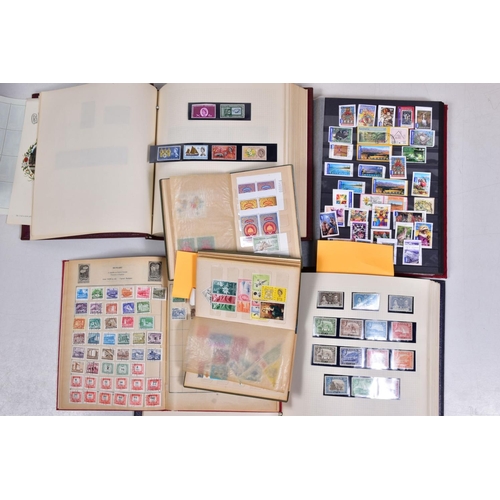 107 - A BOX OF STAMPS AND COVERS contained within five albums and loose, we note a number of Bahrain first... 