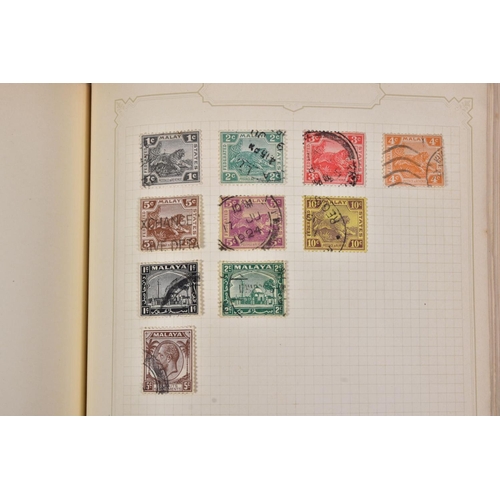 115 - MID PERIOD WORLDWIDE STAMP COLLECTION in a small loose leaf album