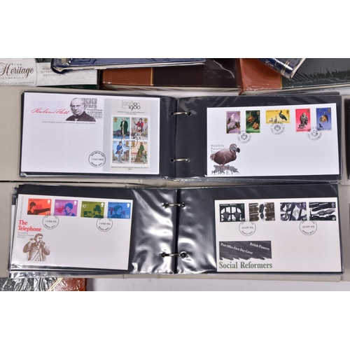 116 - A BOX CONTAINING FOURTEEN ALBUMS viz, four cover albums with 1960's-80's first day covers from GB & ... 