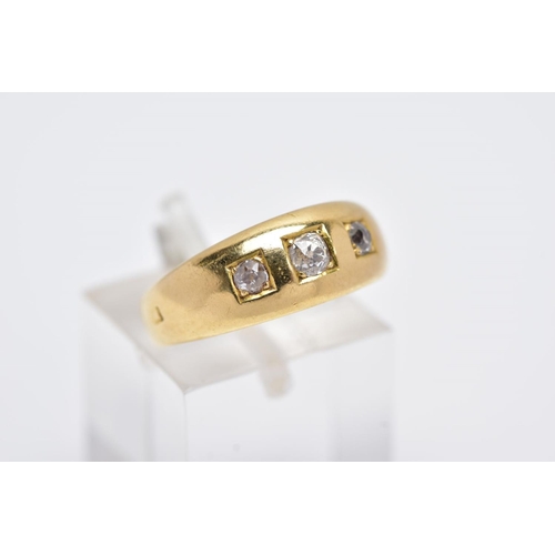 110 - AN EARLY 20TH CENTURY THREE STONE DIAMOND RING, centring on an old cut diamond, total estimated diam... 