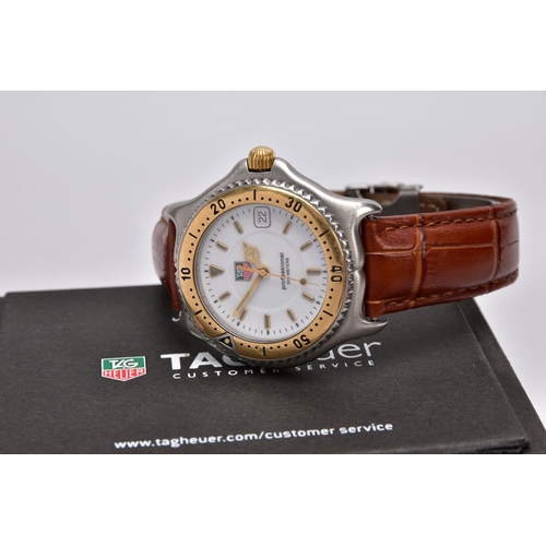 115 - A GENTS 'TAG HEUER' WRISTWATCH, round white dial signed 'Tag Heuer, Professional 200 meters', baton ... 