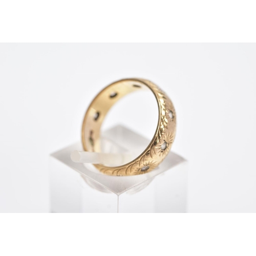 122 - A 9CT GOLD GEM SET BAND, textured engraved design set with circular cut colourless stones assessed a... 