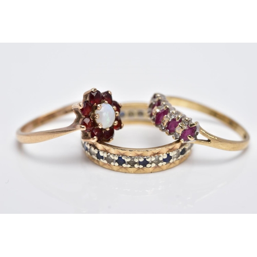 123 - THREE 9CT GOLD GEM SET RINGS, to include a full eternity ring set with colourless spinel and blue sa... 