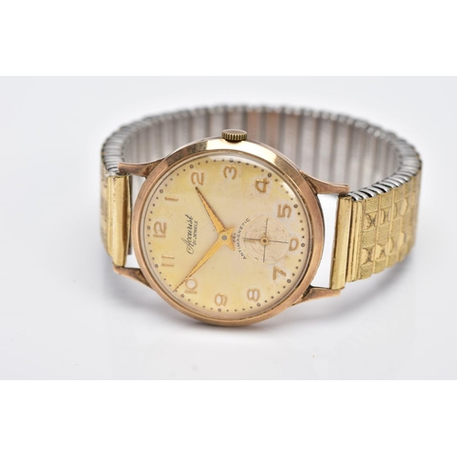 126 - A GENTS 9CT GOLD 'ACCURIST' WRISTWATCH, hand wound movement, discoloured silver dial signed 'Accuris... 