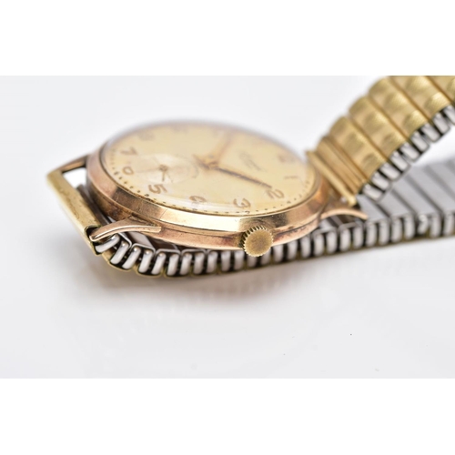 126 - A GENTS 9CT GOLD 'ACCURIST' WRISTWATCH, hand wound movement, discoloured silver dial signed 'Accuris... 