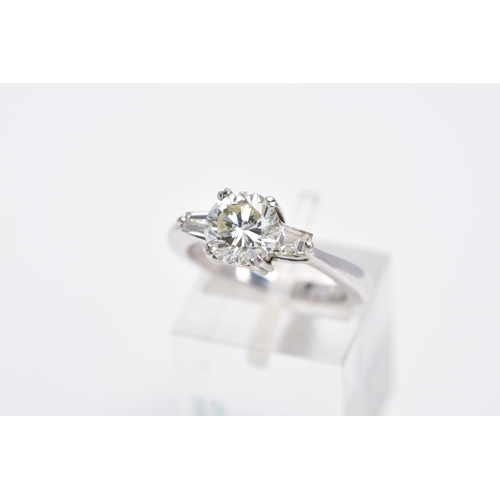 130 - A MODERN DIAMOND THREE STONE RING, a round brilliant cut estimated weight 1.53ct, colour assessed as... 