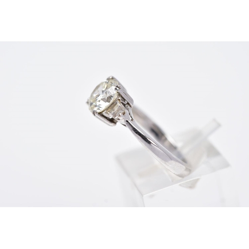 130 - A MODERN DIAMOND THREE STONE RING, a round brilliant cut estimated weight 1.53ct, colour assessed as... 