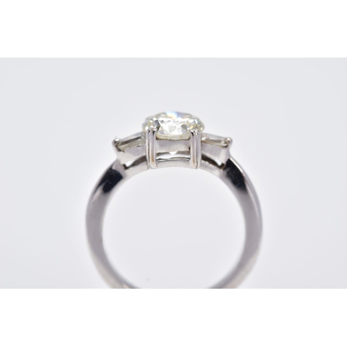 130 - A MODERN DIAMOND THREE STONE RING, a round brilliant cut estimated weight 1.53ct, colour assessed as... 