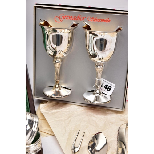 146 - A COMPLETE CANTEEN OF CUTLERY, TWO GOBLETS, SIX NAPKIN RINGS AND A THREE PIECE CUTLERY SET, the wood... 