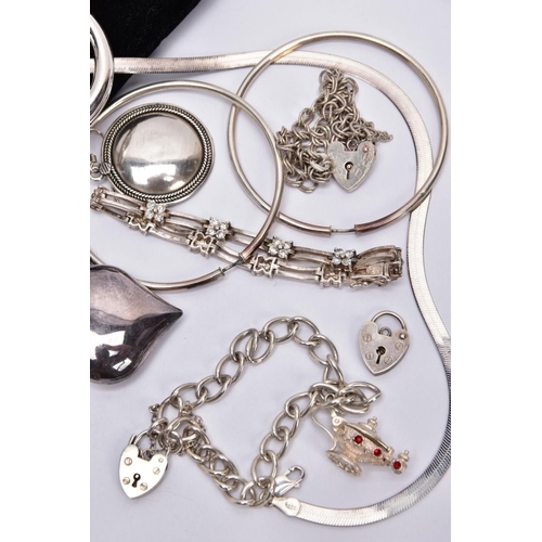 157 - A BAG OF ASSORTED SILVER AND WHITE METAL JEWELLERY, to include a silver charm bracelet suspending fi... 