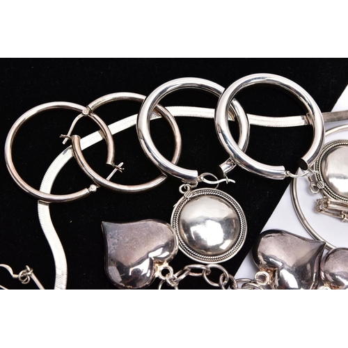 157 - A BAG OF ASSORTED SILVER AND WHITE METAL JEWELLERY, to include a silver charm bracelet suspending fi... 