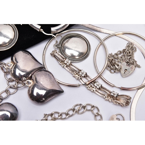 157 - A BAG OF ASSORTED SILVER AND WHITE METAL JEWELLERY, to include a silver charm bracelet suspending fi... 