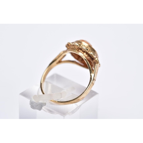 159 - A 9CT GOLD CAMEO RING, oval form depicting a lady in profile, collet mount and scallop edge surround... 