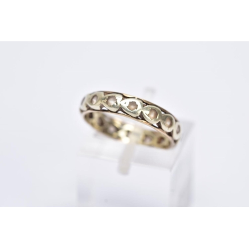 161 - A 9CT GOLD FULL ETERNITY RING, set with colourless stones assessed as spinel, each within a heart sh... 