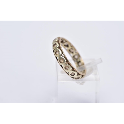 161 - A 9CT GOLD FULL ETERNITY RING, set with colourless stones assessed as spinel, each within a heart sh... 