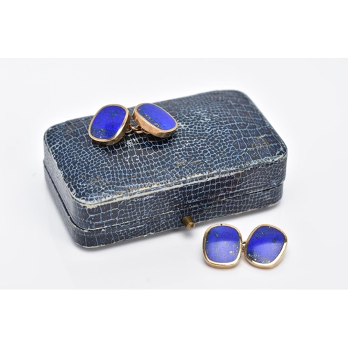 17 - A PAIR OF 9CT GOLD, LAPIS LAZULI CUFFLINKS, each designed with two rub over set lapis lazuli set pan... 