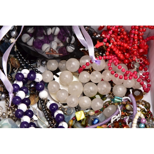 175 - A TRAY OF ASSORTED SEMI-PRECIOUS JEWELLERY, to include a multi stranded red coral branch/polished be... 