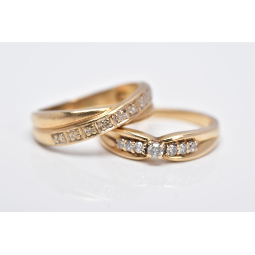 18 - TWO 9CT GOLD DIAMOND RINGS, the first designed with a row of seven round brilliant cut diamonds, sta... 