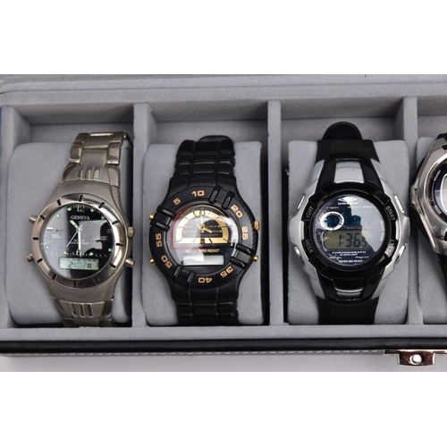 182 - A WATCH DISPLAY CASE WITH DIGITAL WRISTWATCHES, black and glass panelled display case with six watch... 