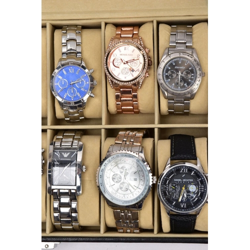 187 - A WATCH DISPLAY CASE WITH WATCHES, a black and glass panelled watch display case with twelve watches... 