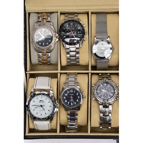 187 - A WATCH DISPLAY CASE WITH WATCHES, a black and glass panelled watch display case with twelve watches... 