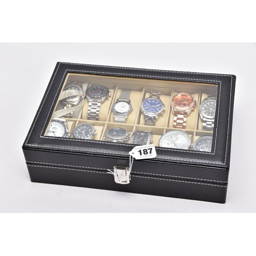 187 - A WATCH DISPLAY CASE WITH WATCHES, a black and glass panelled watch display case with twelve watches... 