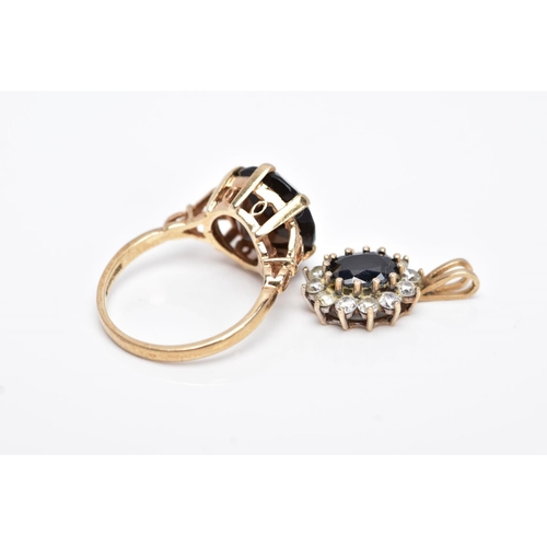 19 - A 9CT GOLD SMOKEY QUARTZ RING AND A 9CT GOLD SAPPHIRE PENDANT, the ring designed with a claw set, ci... 