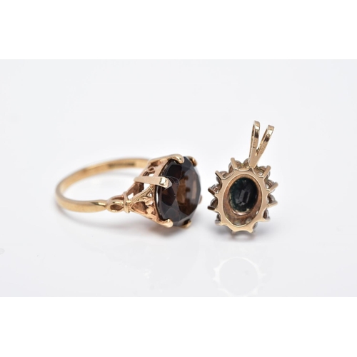 19 - A 9CT GOLD SMOKEY QUARTZ RING AND A 9CT GOLD SAPPHIRE PENDANT, the ring designed with a claw set, ci... 